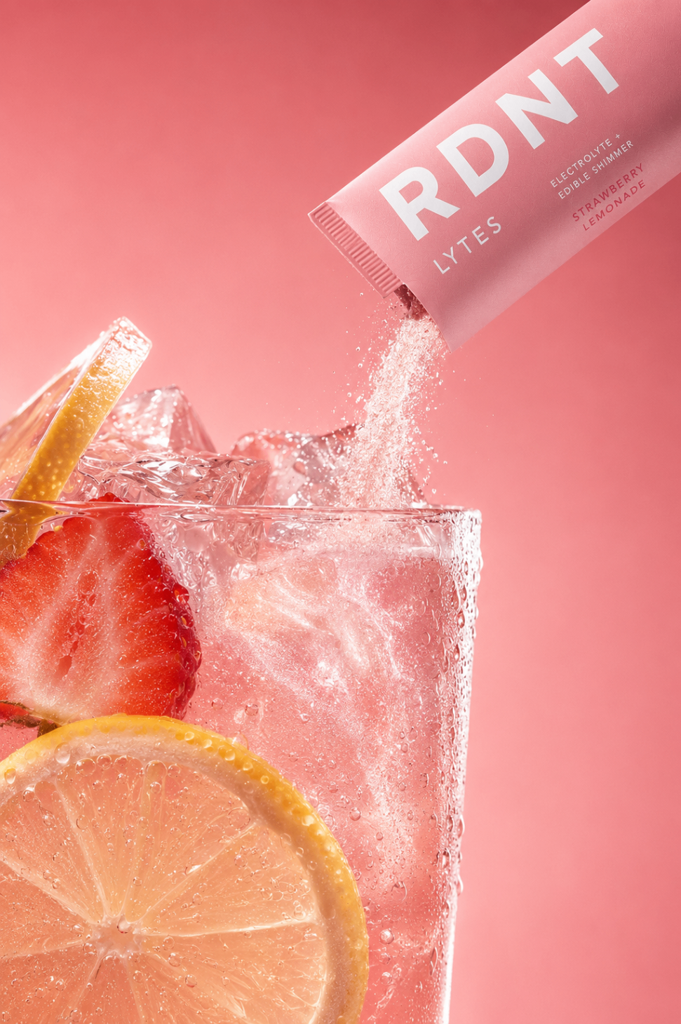RDNT LYTES sachet pouring shimmering pink powder into a glass of iced water